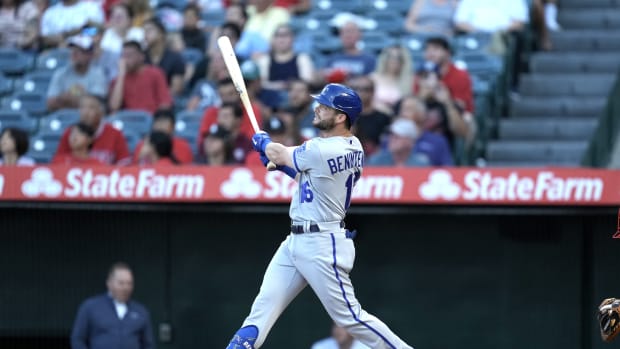 Jun 20, 2022; Anaheim, California, USA; Kansas City Royals left fielder Andrew Benintendi (16) follows through on a two-run home run in the first inning against the Kansas City Royals at Angel Stadium. Mandatory Credit: Kirby Lee-USA TODAY Sports